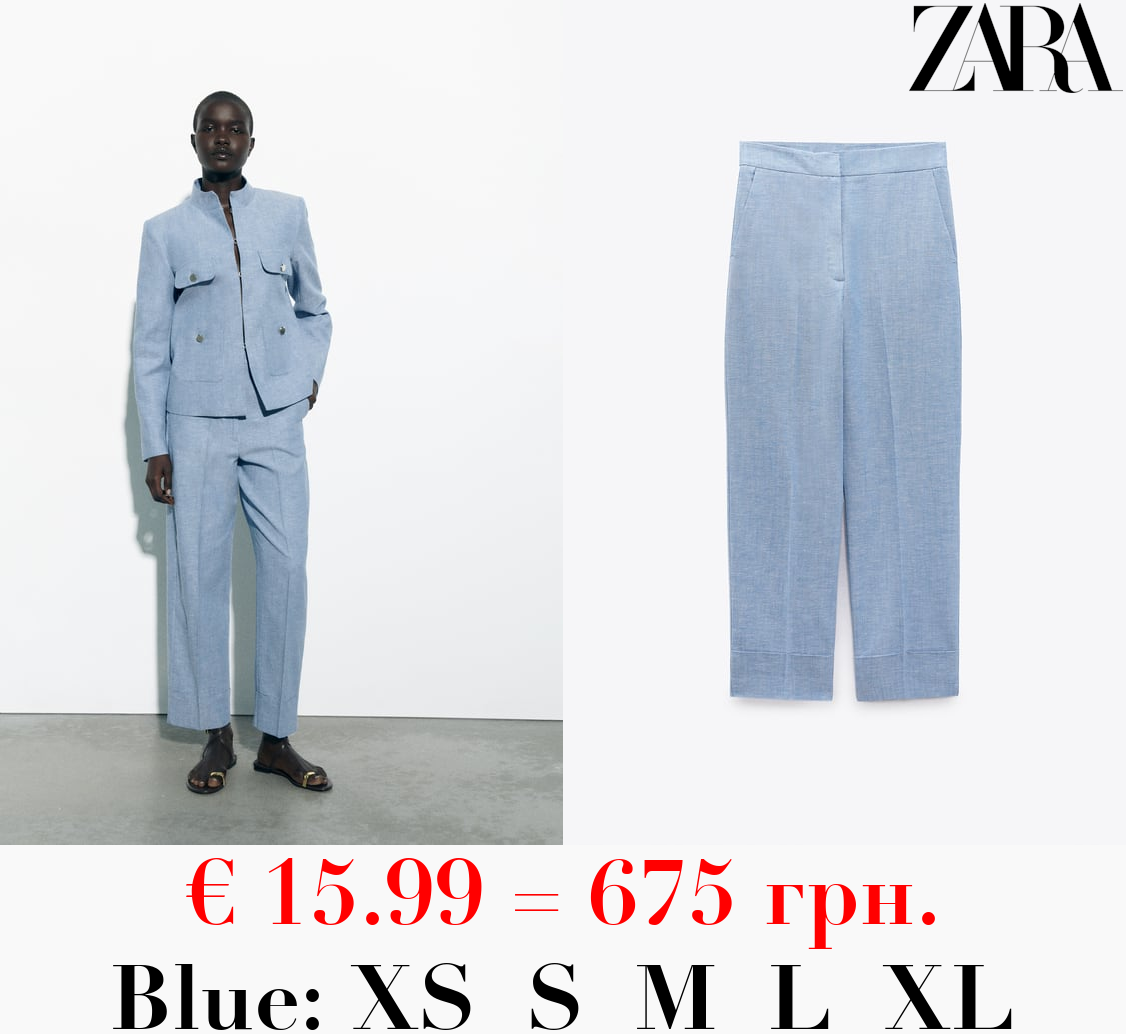 STRAIGHT-LEG TROUSERS WITH TURN-UP HEMS