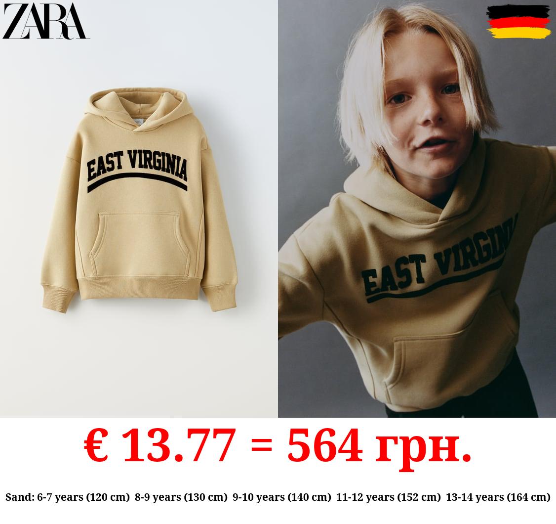 FLOCKED SLOGAN HOODIE