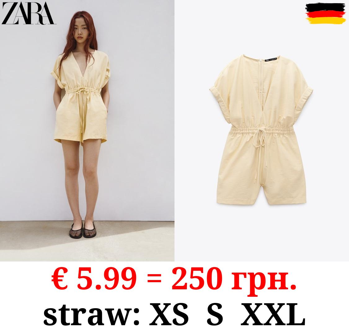 SHORT JUMPSUIT WITH TIED BOW