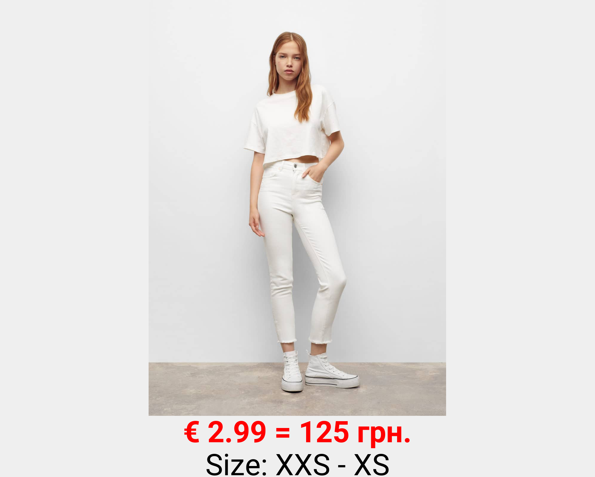 Jeans slim bajo deshilachado