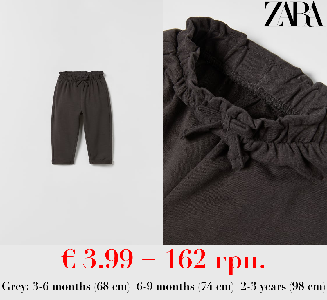 BOHO-STYLE TROUSERS WITH BOW