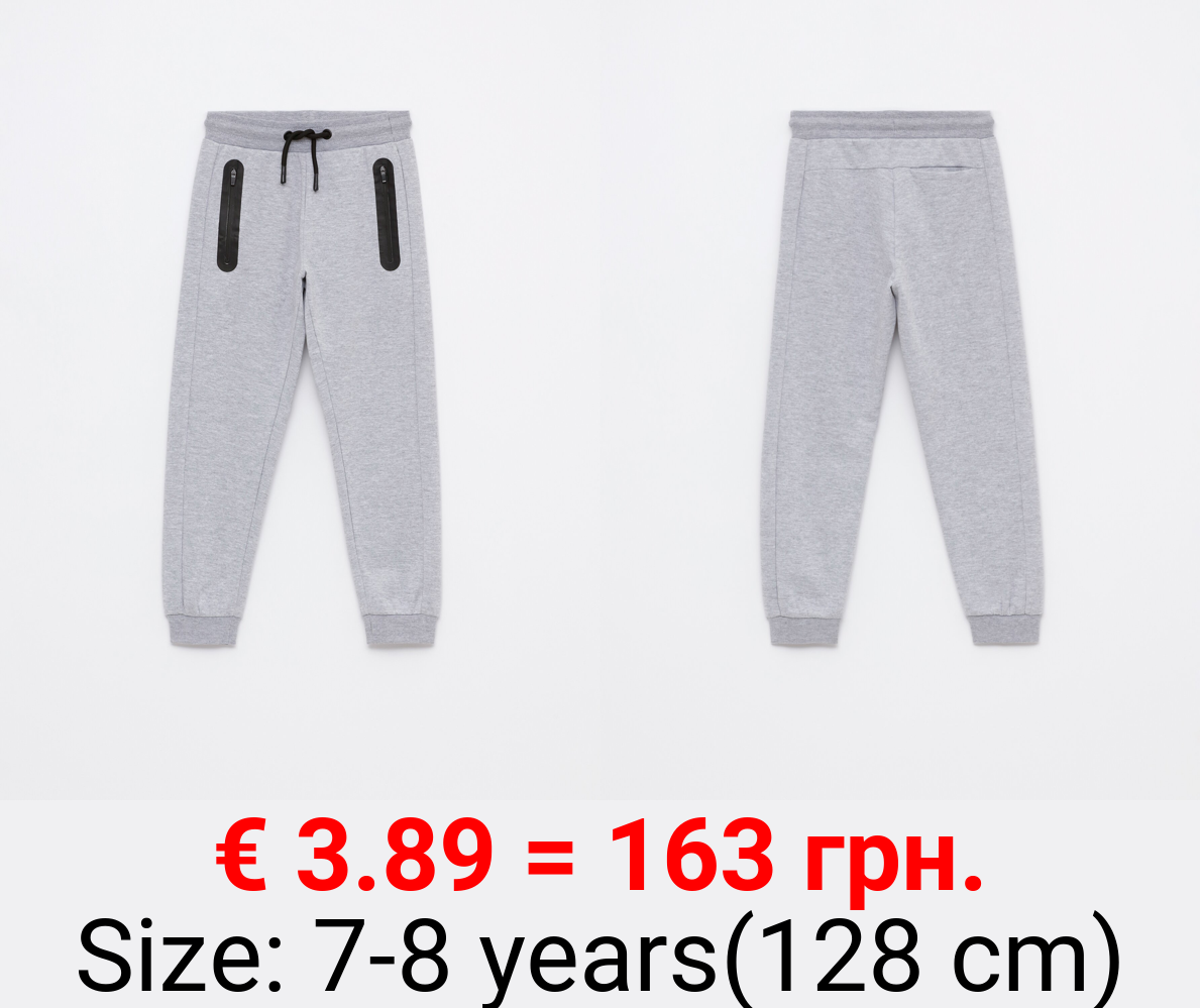 Plush trousers with zips
