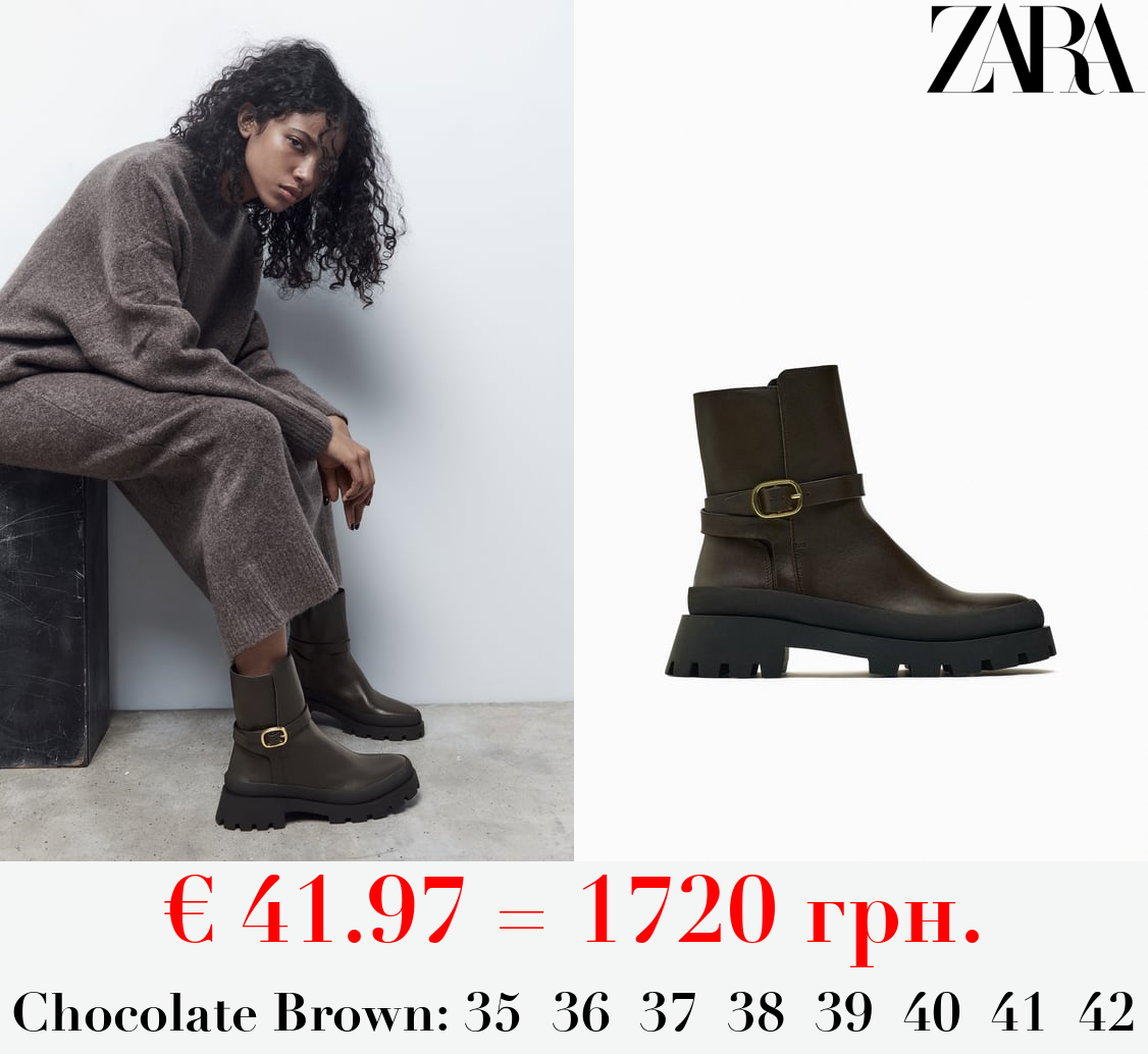FLAT LEATHER ANKLE BOOTS WITH TRACK SOLE