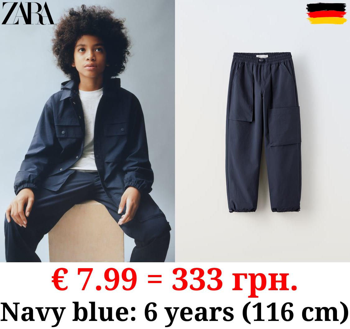 LINED NYLON TROUSERS