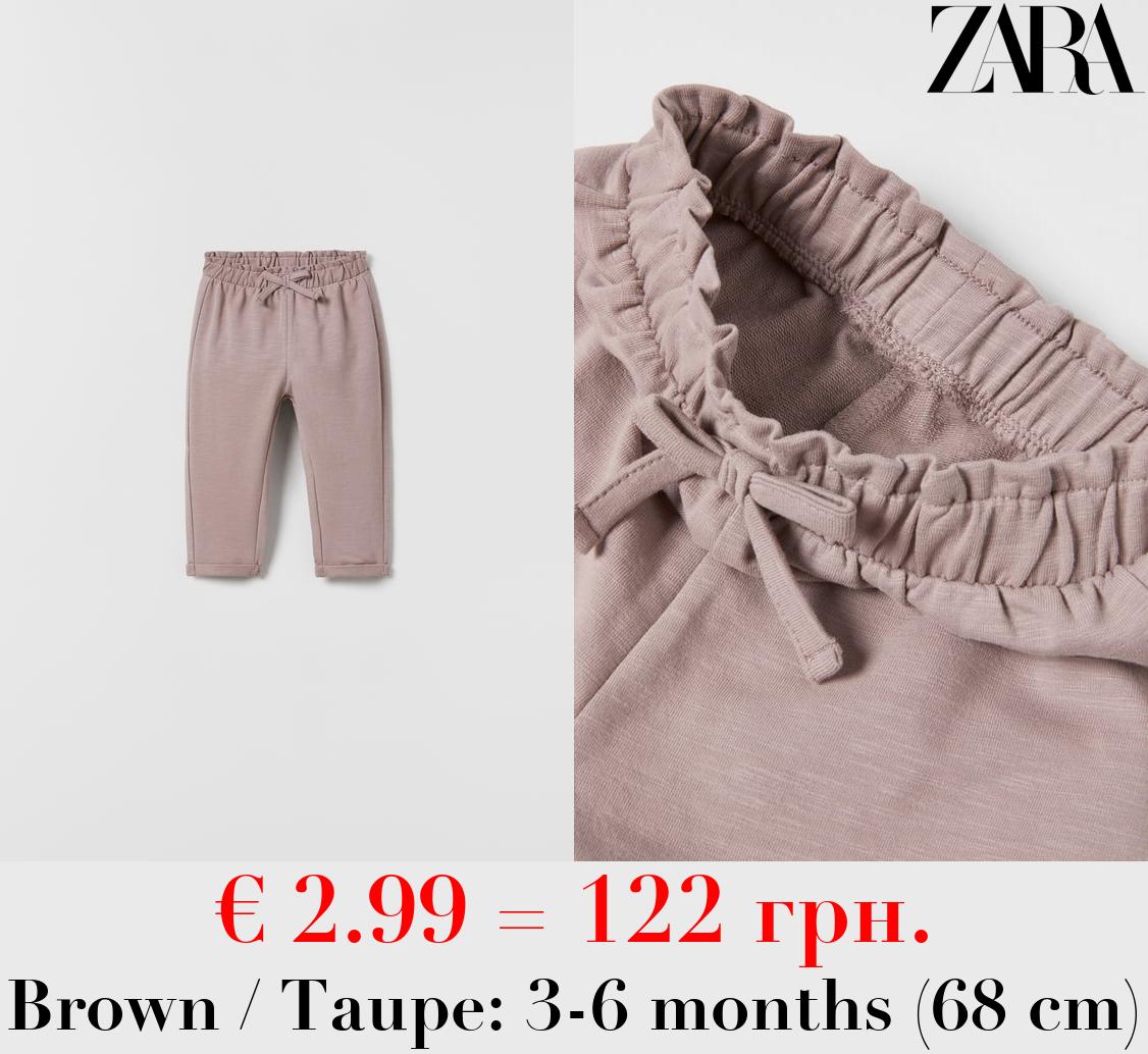 BOHO-STYLE TROUSERS WITH BOW