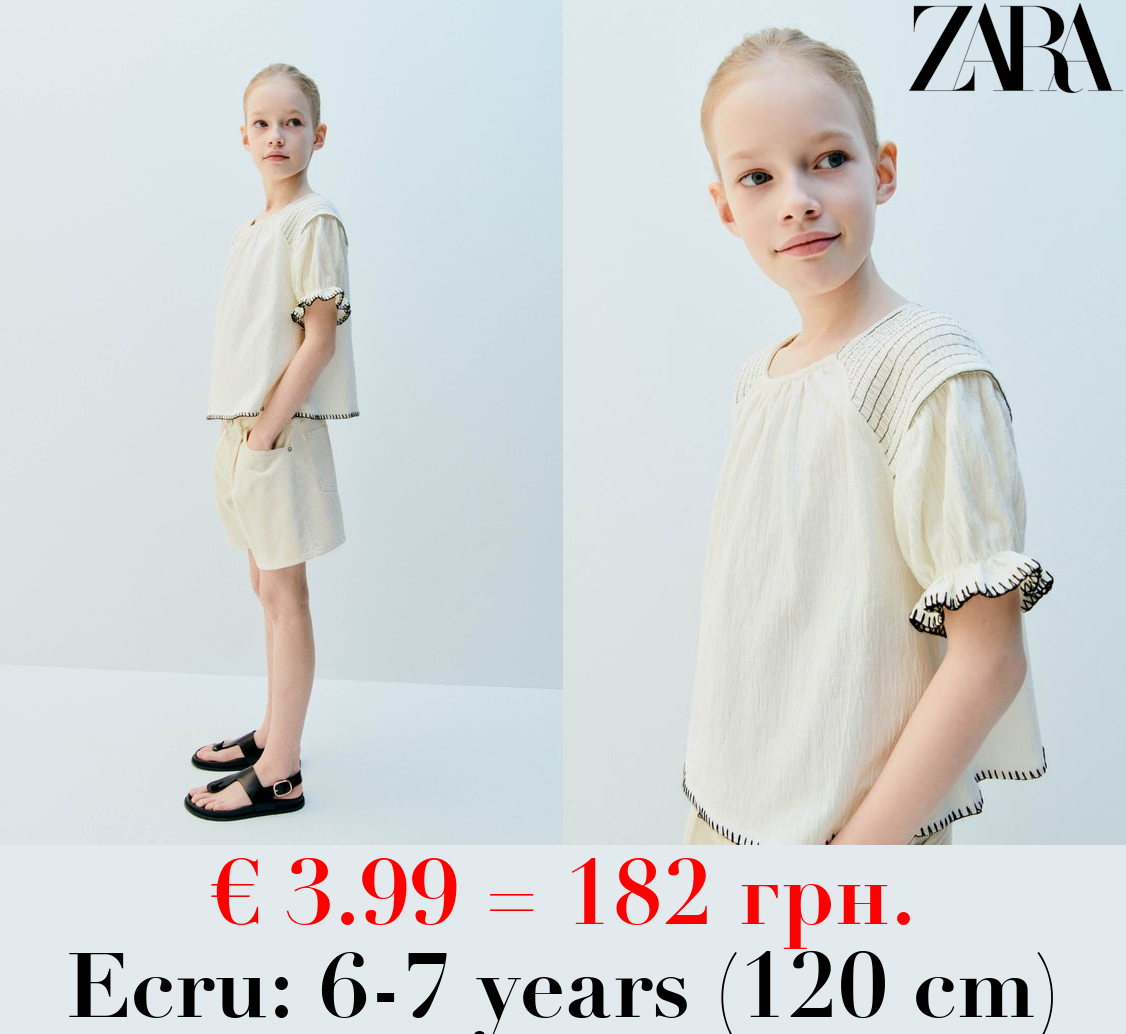 TEXTURED T-SHIRT WITH CONTRAST TOPSTITCHING