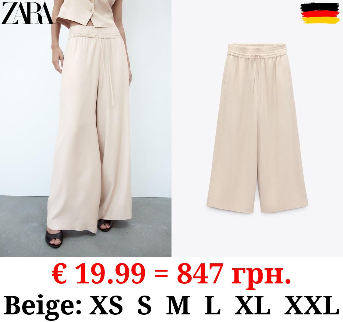 WIDE-LEG FLOWING TROUSERS