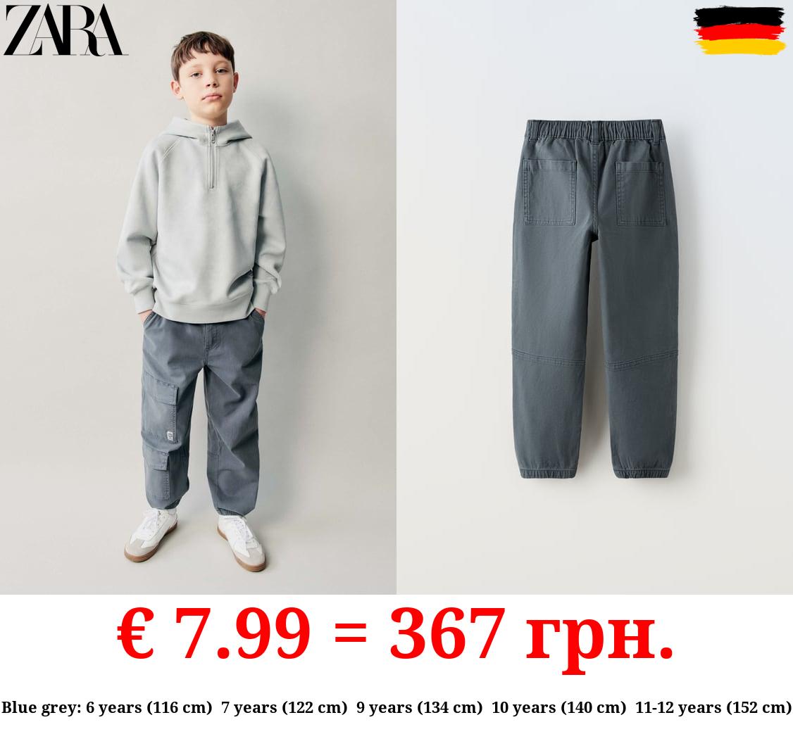 CANVAS TROUSERS WITH POCKETS