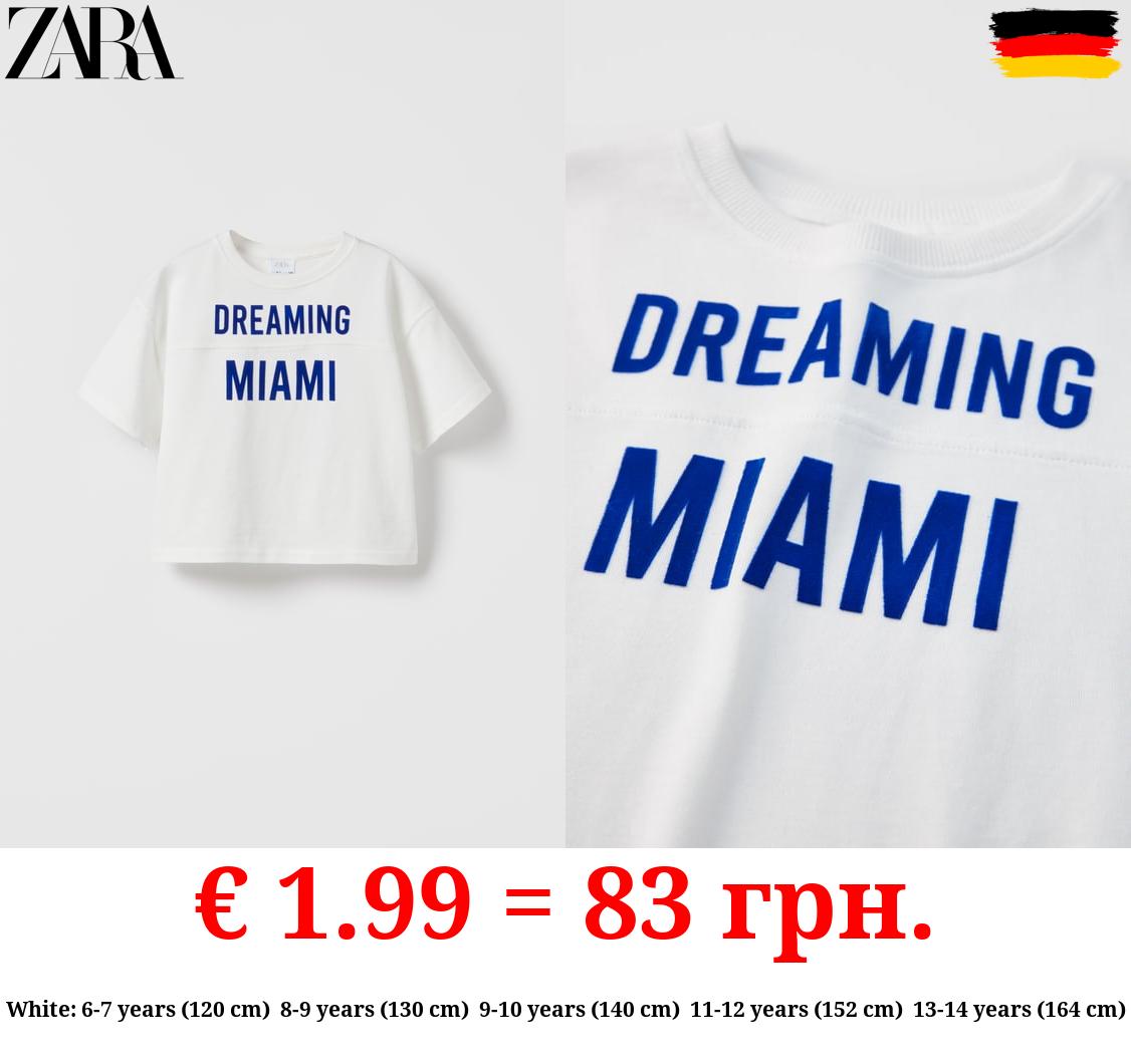 T-SHIRT WITH EMBOSSED TEXT