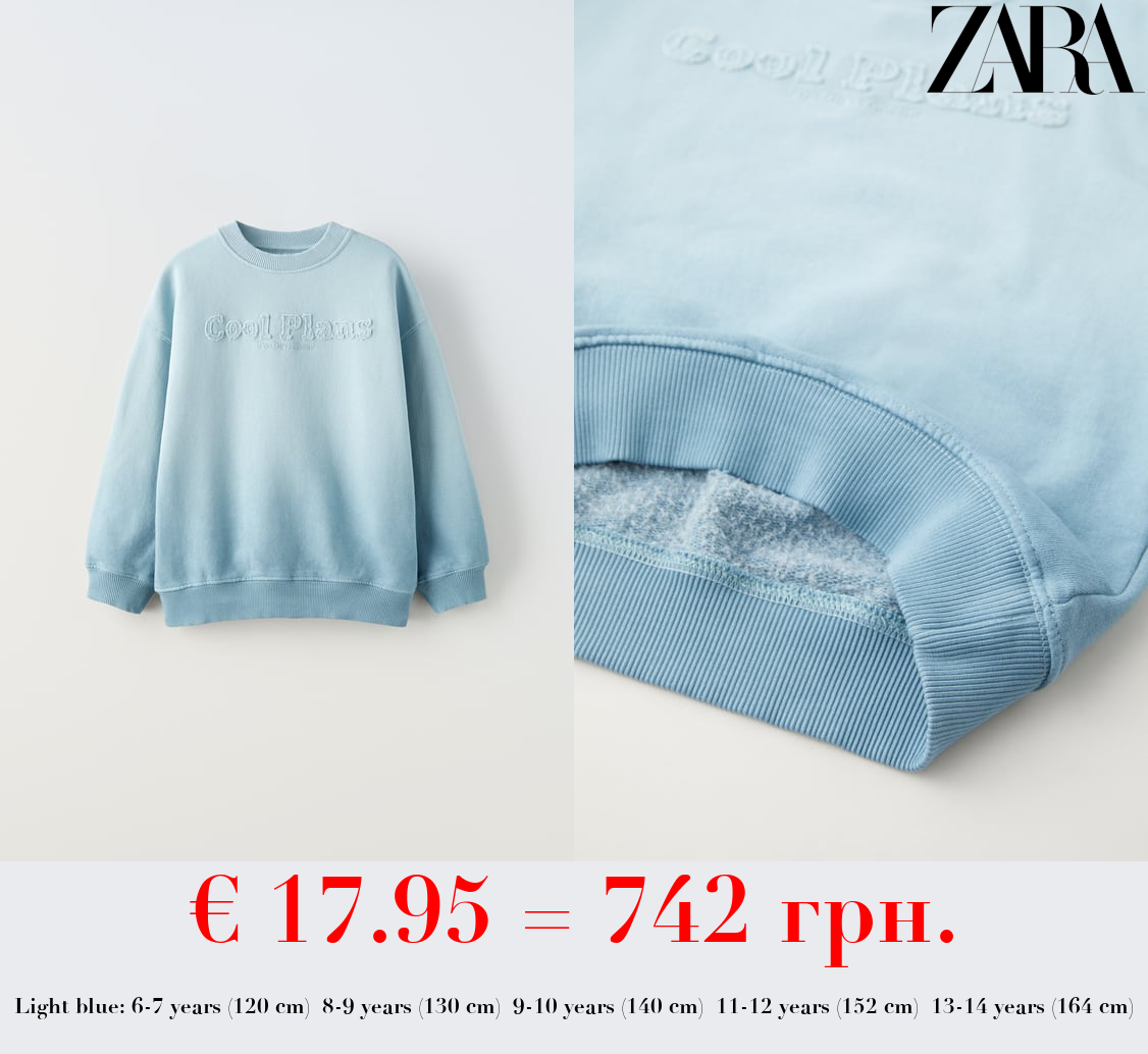 SWEATSHIRT WITH SLOGAN PATCH