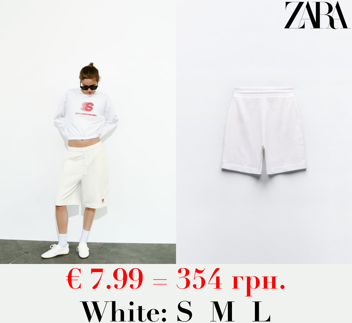 BERMUDA SHORTS WITH SLOGAN DETAIL