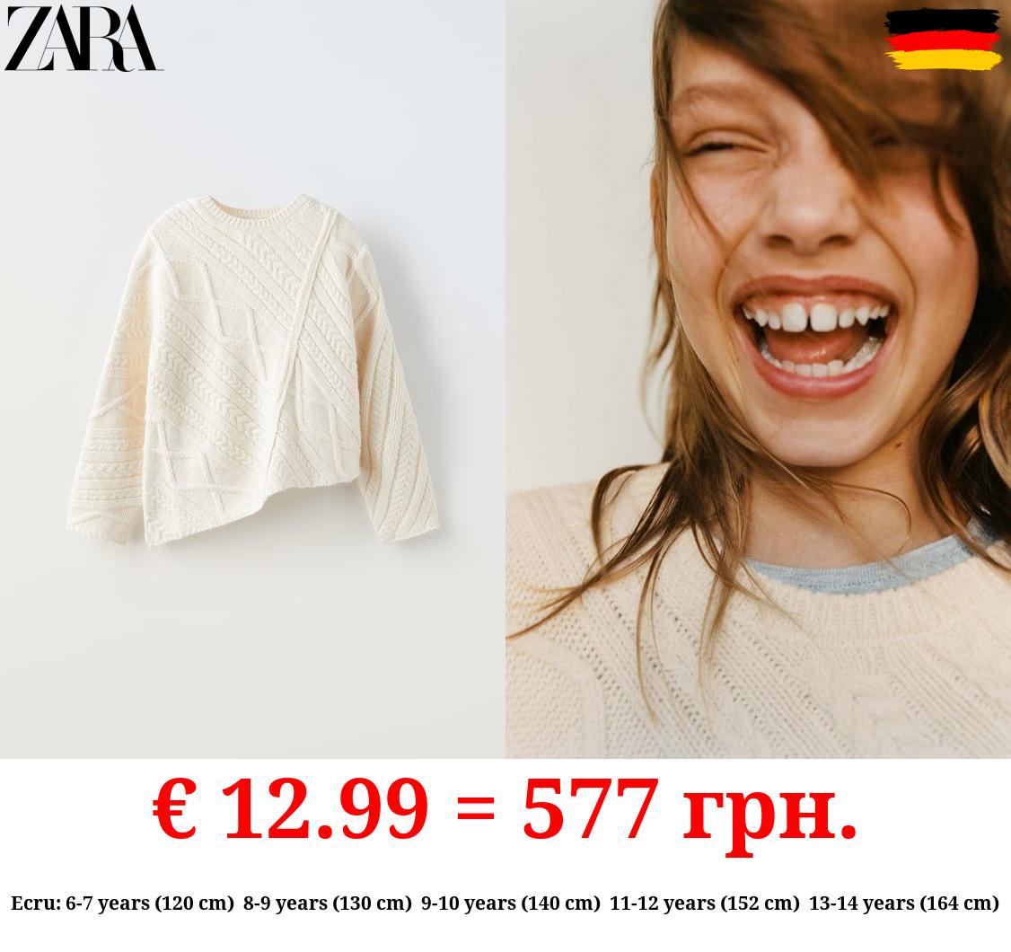 ASYMMETRIC KNIT SWEATER