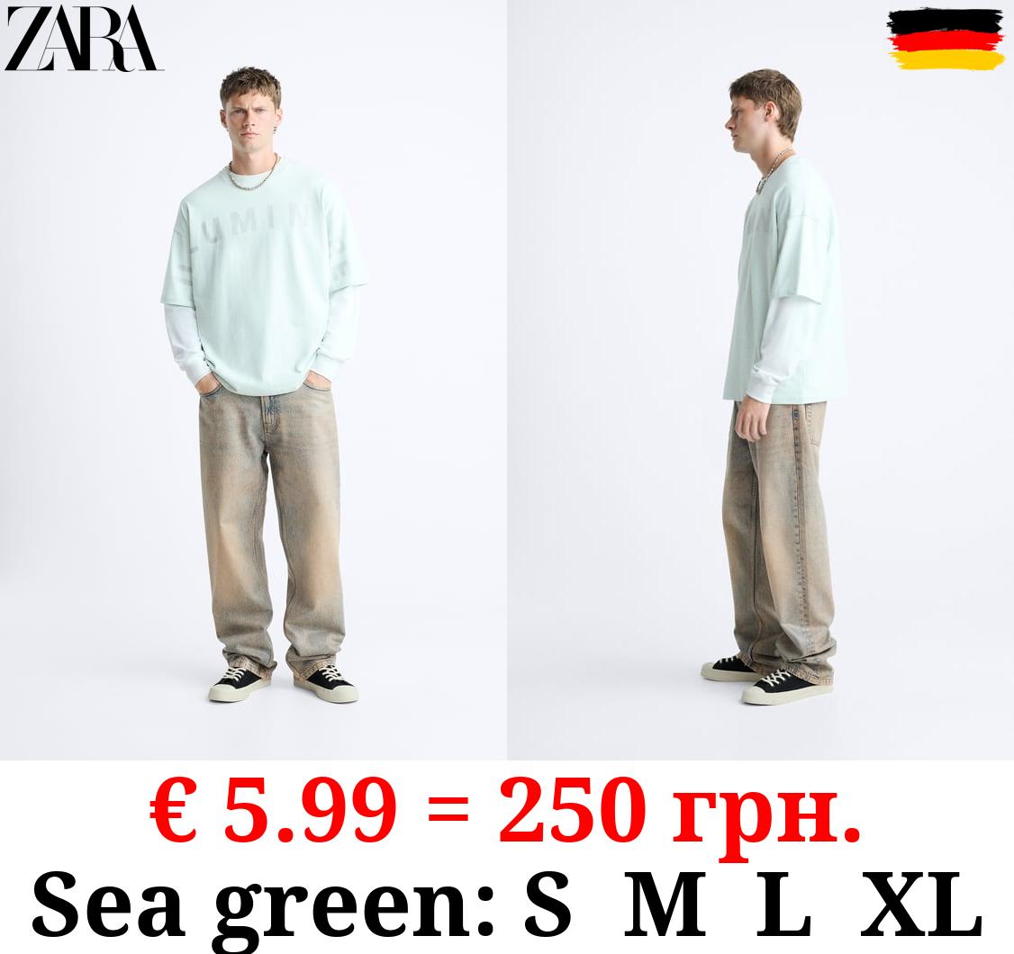 T-SHIRT WITH SUNLIGHT-REACTIVE SLOGAN