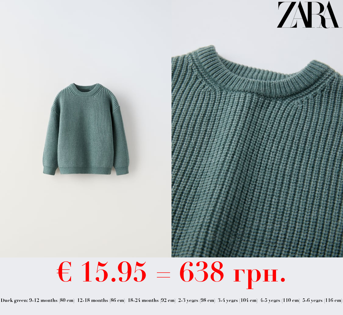 HALF-CARDIGAN KNIT SWEATER