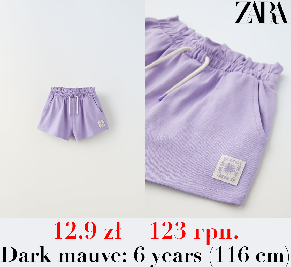 PLUSH BERMUDA SHORTS WITH LABEL DETAIL