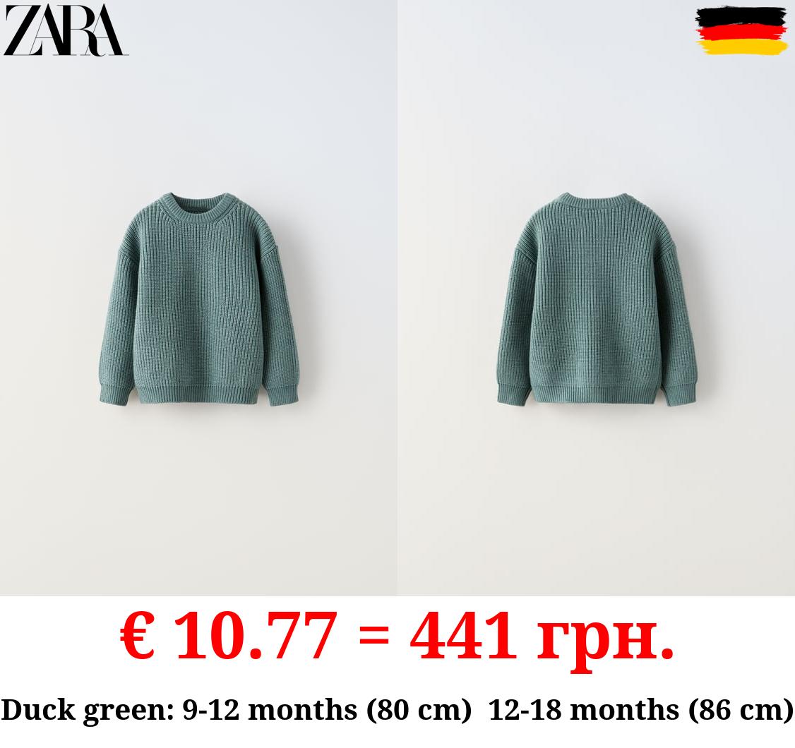 HALF-CARDIGAN KNIT SWEATER