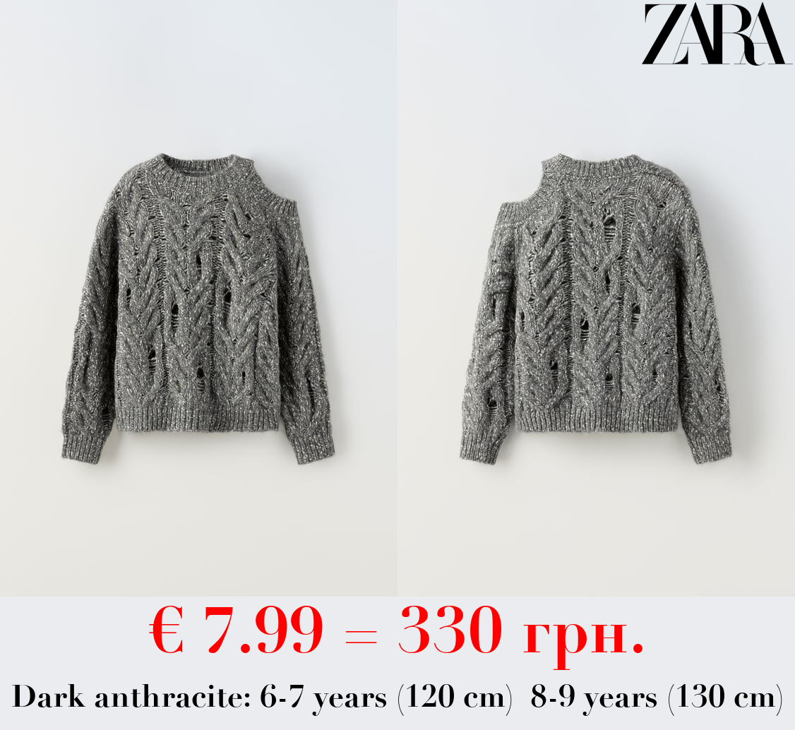 CUT-OUT CABLE-KNIT SWEATER