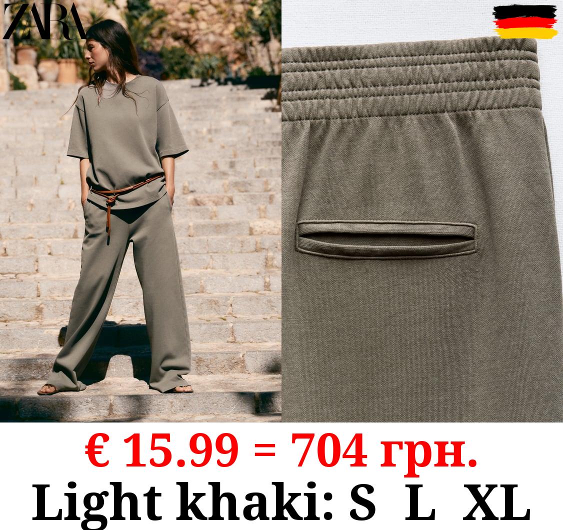 WASHED INTERLOCK TROUSERS