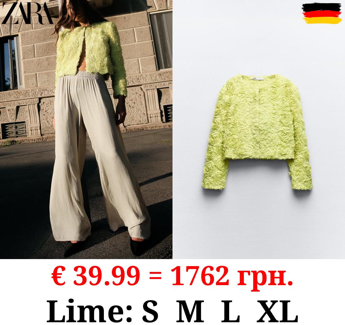 JACKET WITH TEXTURED FLOWER DETAIL