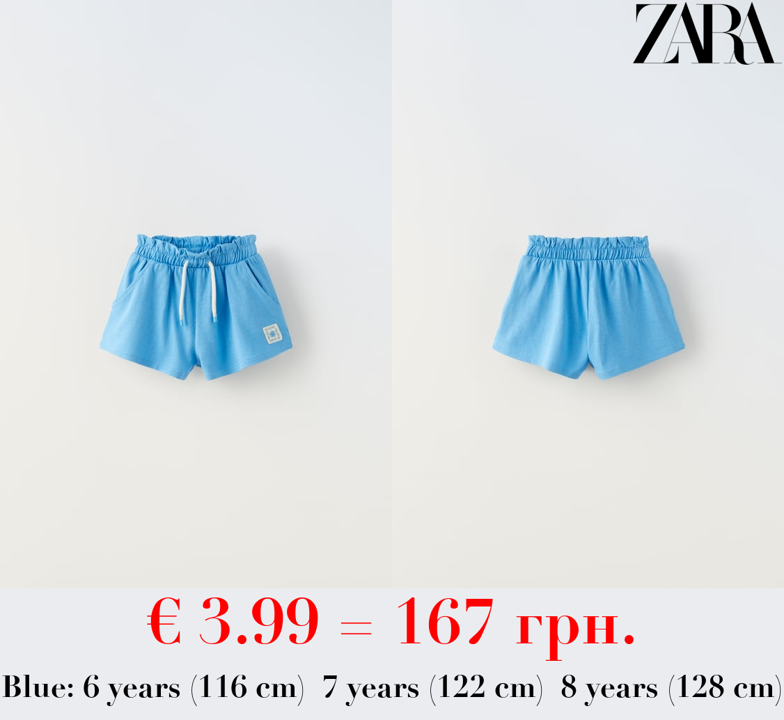 PLUSH BERMUDA SHORTS WITH LABEL DETAIL