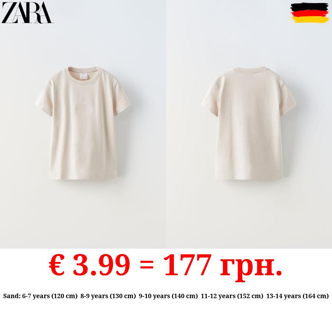 T-SHIRT WITH EMBROIDERED SLOGAN