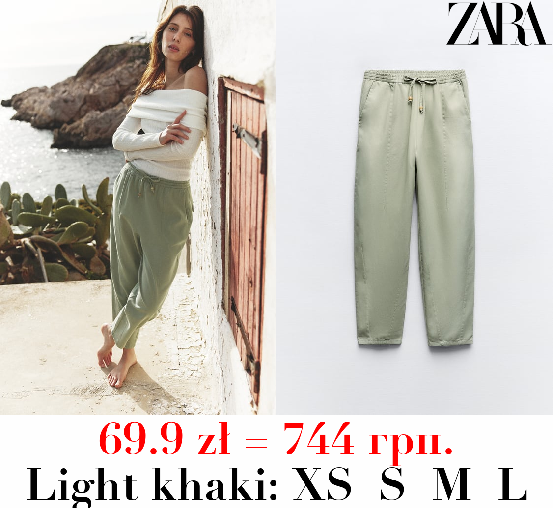 TROUSERS WITH AN ELASTICATED WAISTBAND