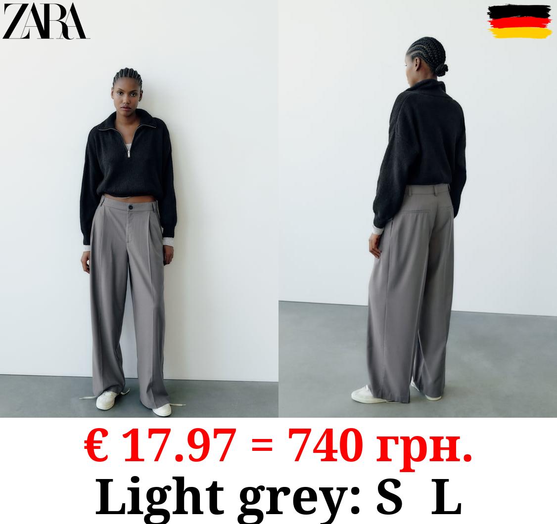 FULL-LENGTH PLEATED TROUSERS