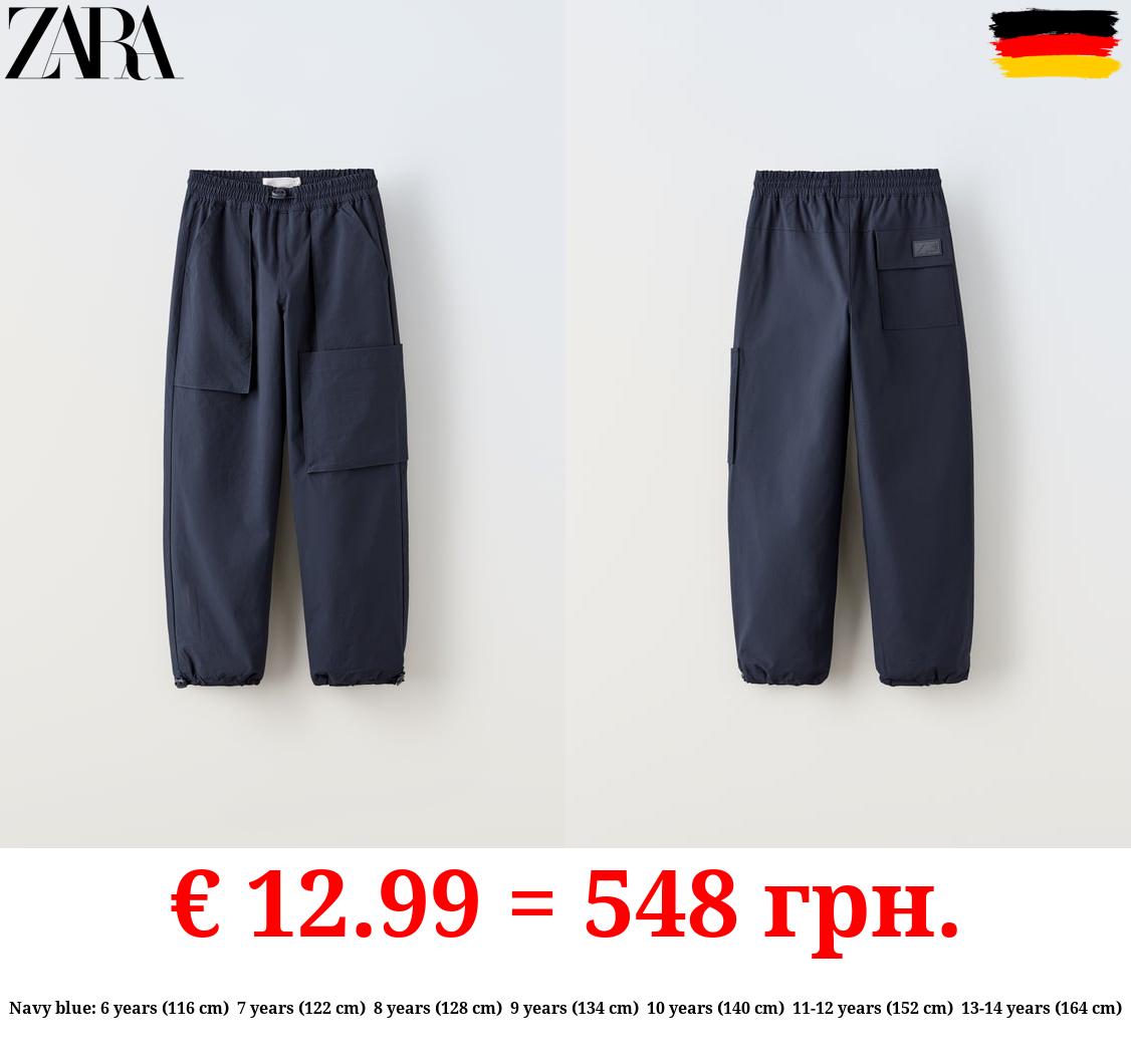 LINED NYLON TROUSERS