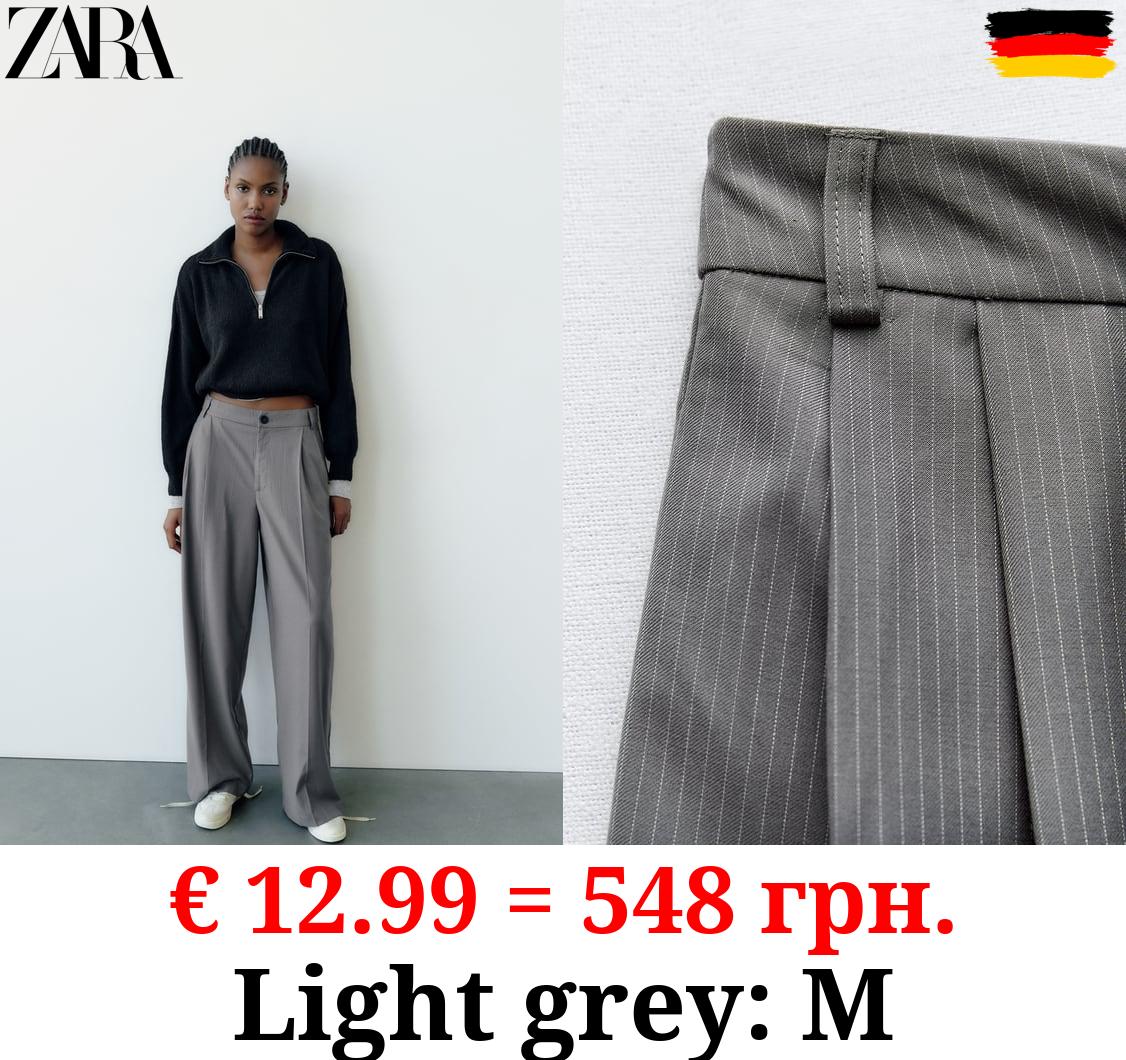 FULL-LENGTH PLEATED TROUSERS