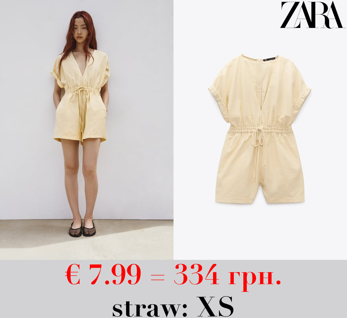 SHORT JUMPSUIT WITH TIED BOW