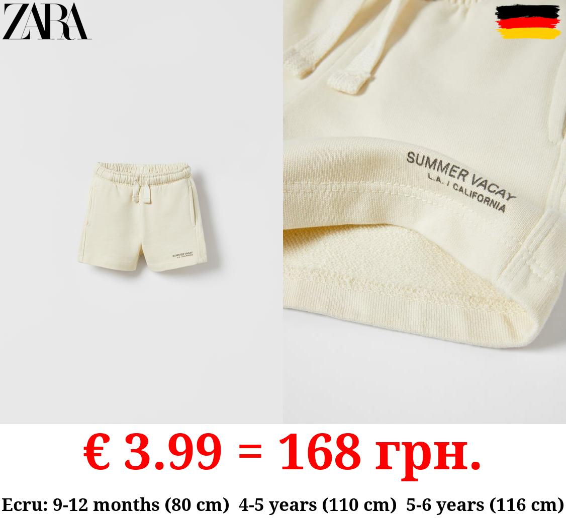 PLUSH JERSEY BERMUDAS WITH SLOGAN