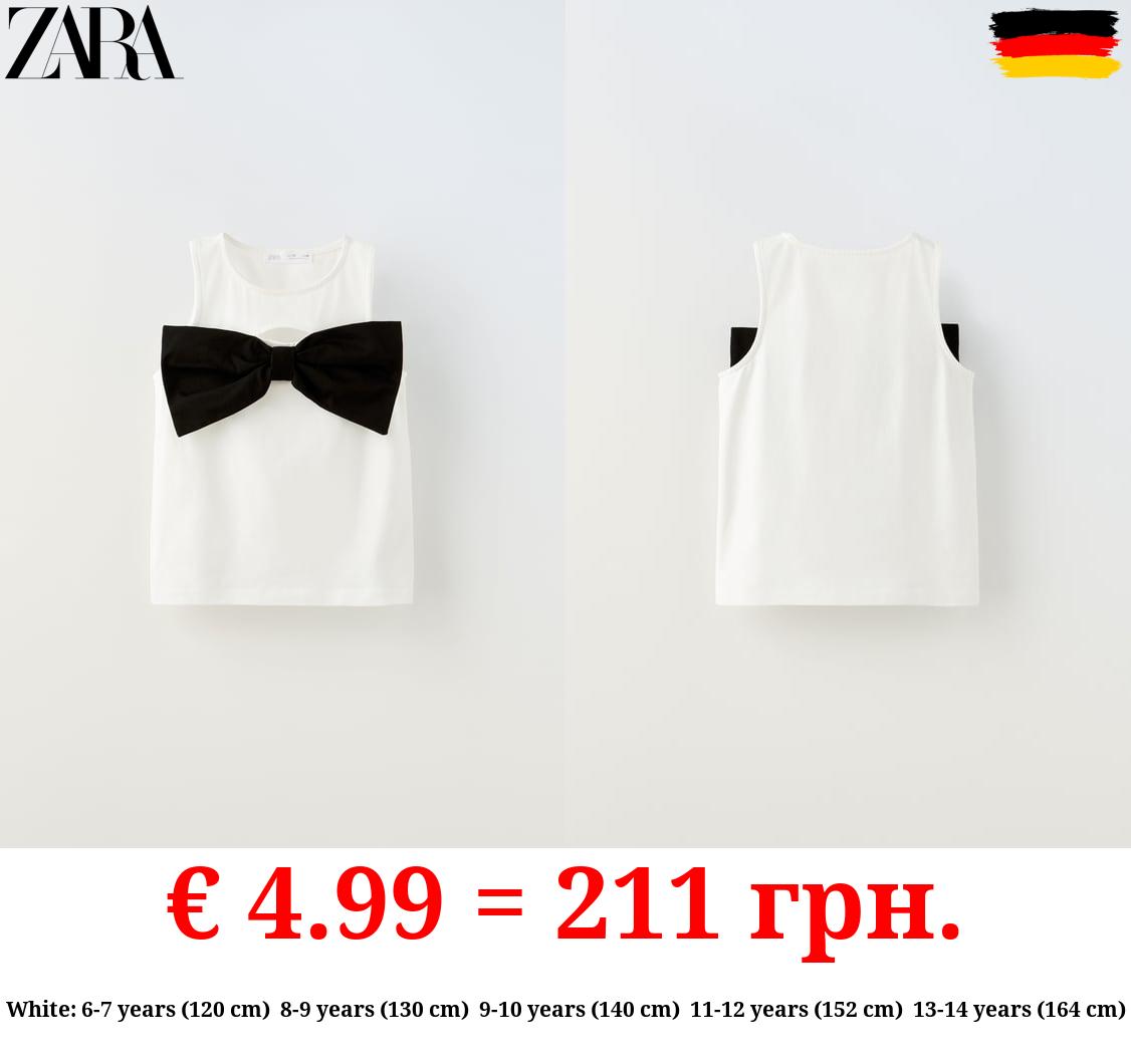 CUT OUT T-SHIRT WITH BOW