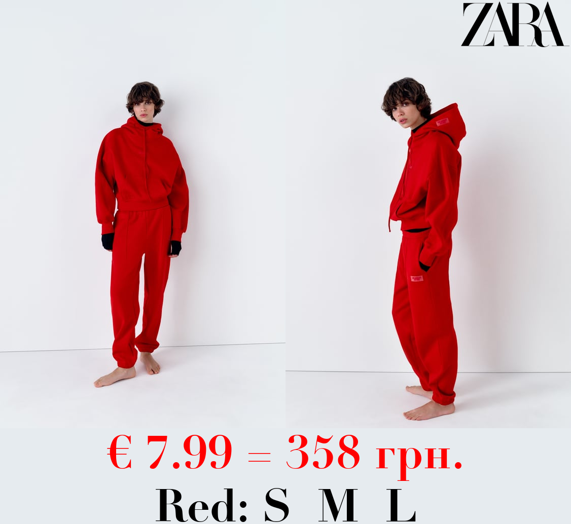 PLUSH JOGGING TROUSERS WITH SLOGAN