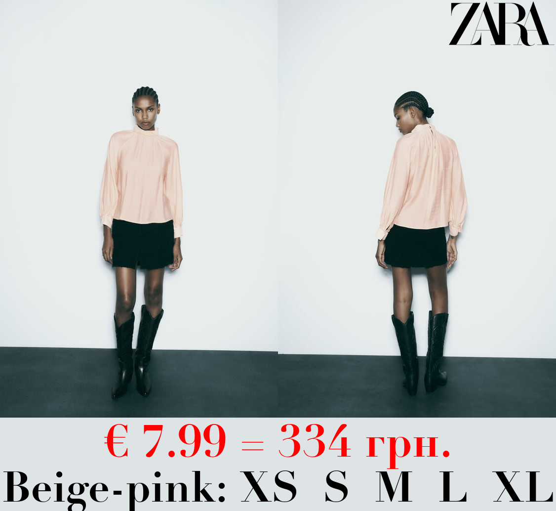 ROLL NECK TOP WITH FAUX PEARL DETAIL