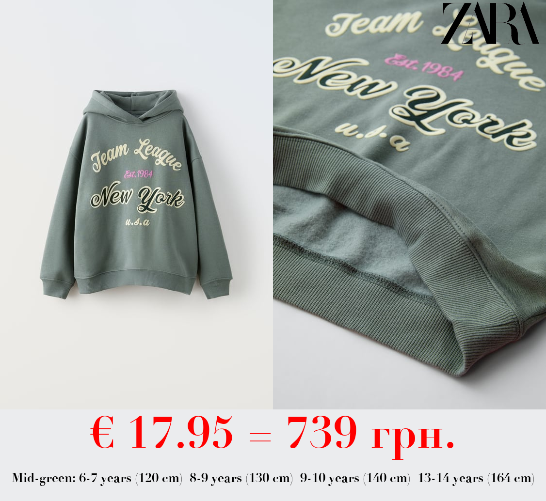 FLOCKED SLOGAN HOODIE