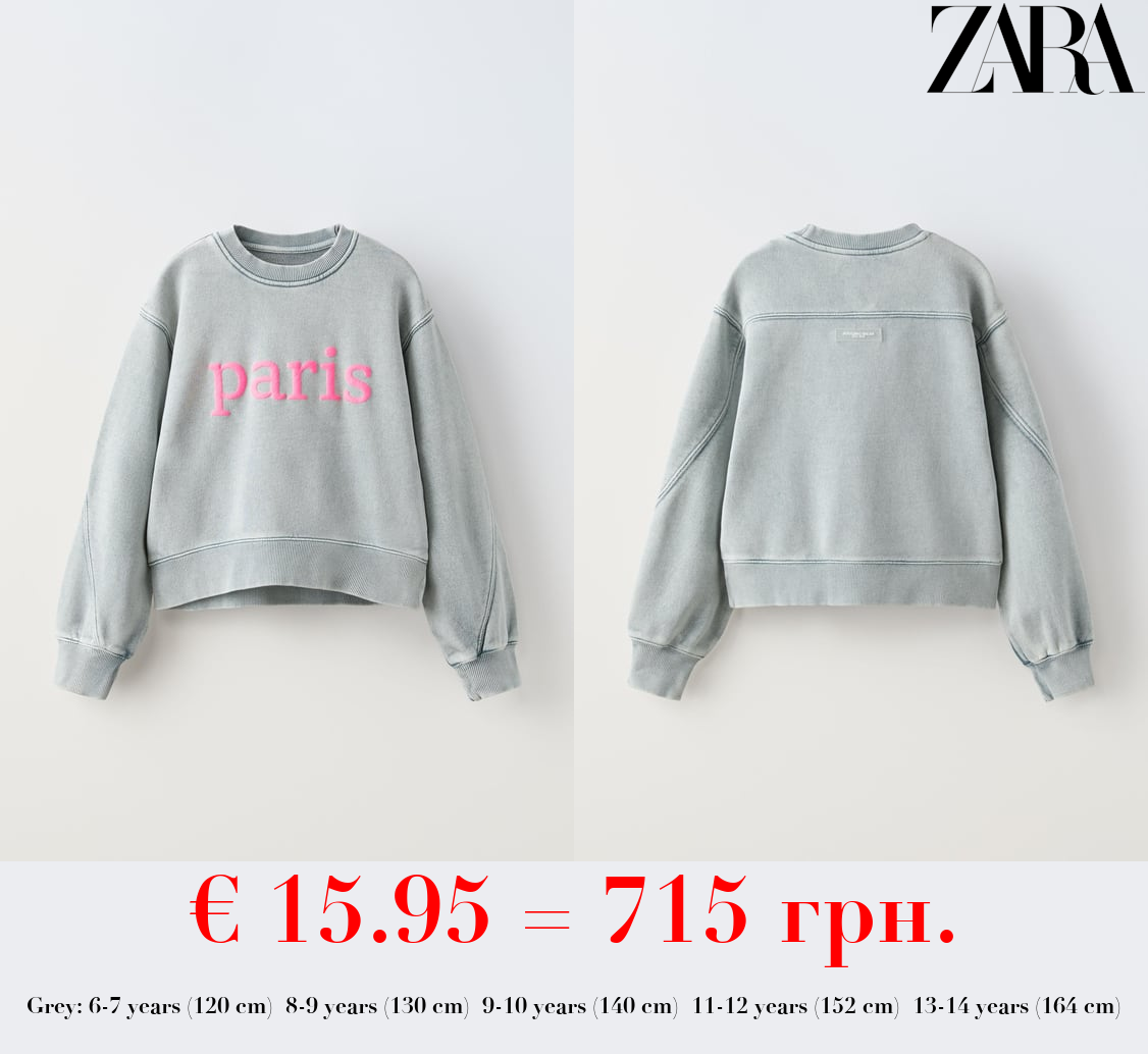 FADED SWEATSHIRT WITH SLOGAN
