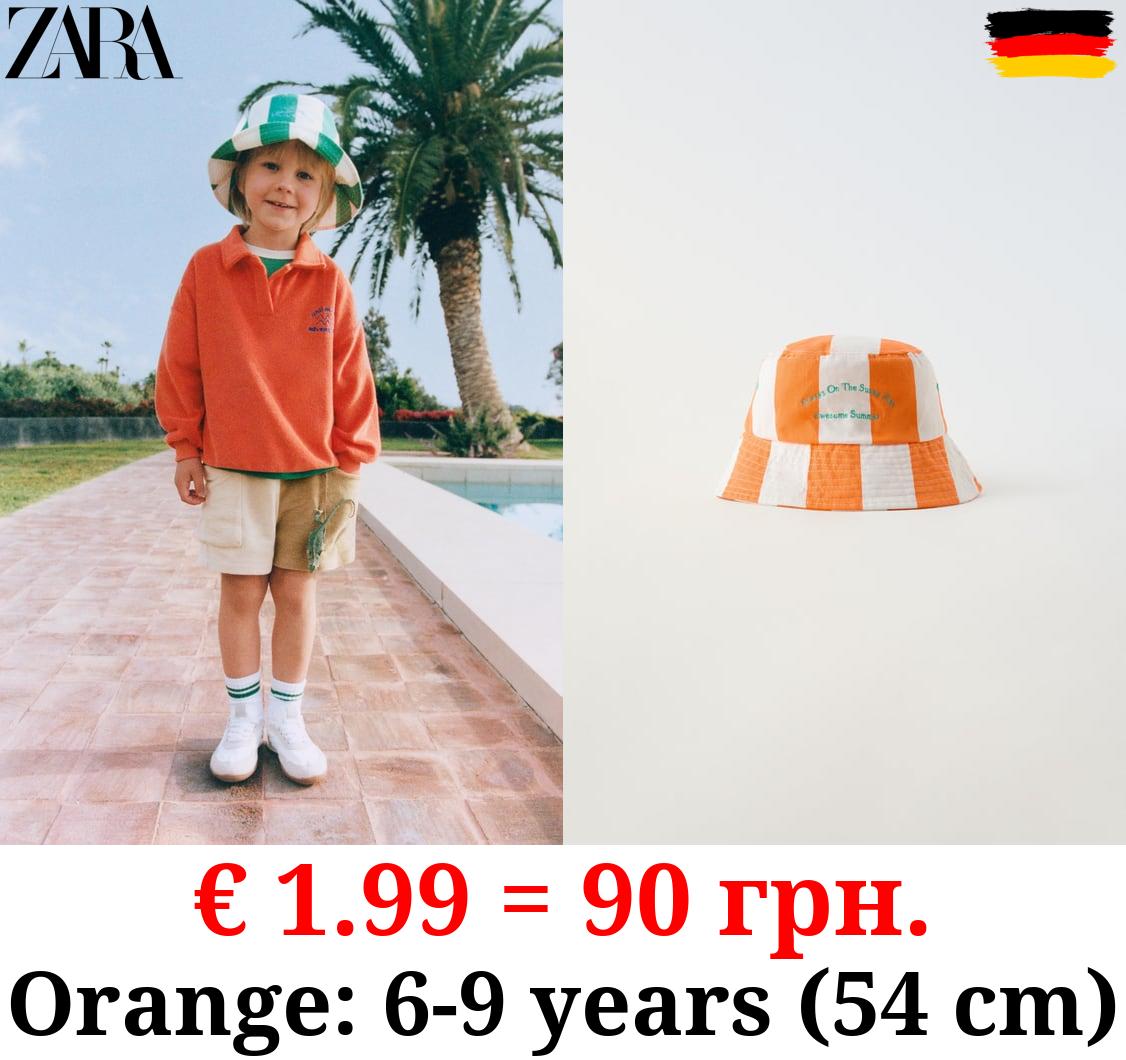 STRIPED BUCKET HAT WITH SLOGAN