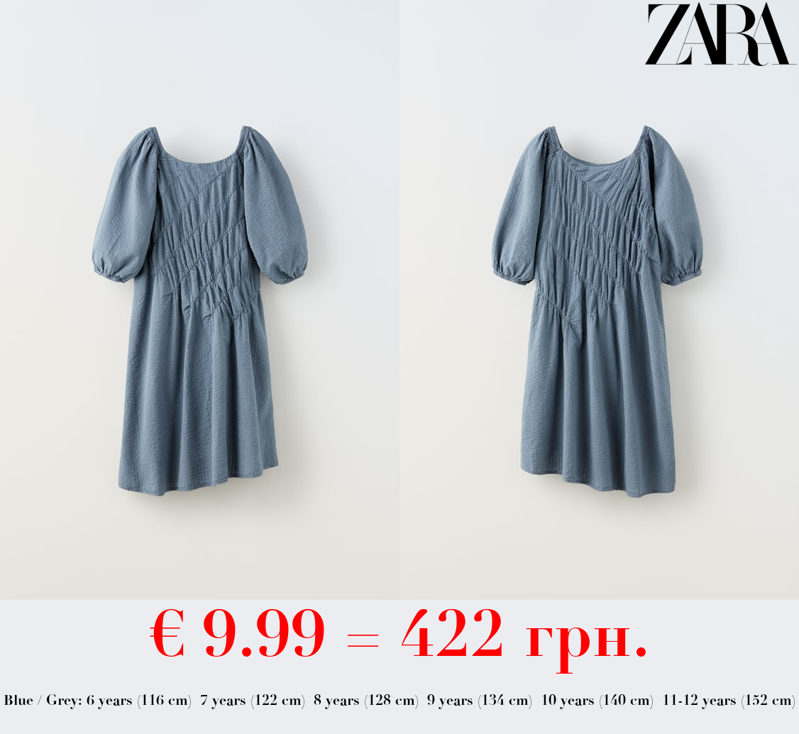 DRESS WITH SEAMS AND ELASTICATED DETAILS